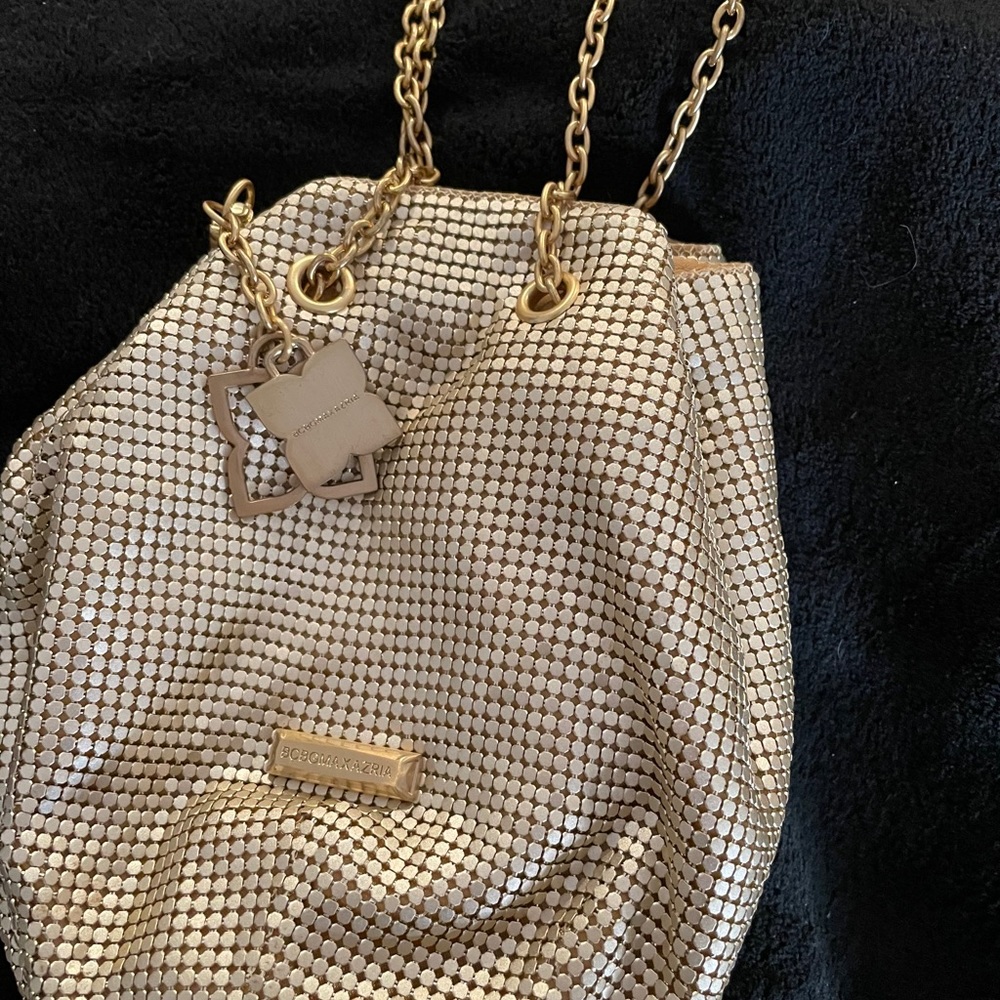 Gold “BCBGMAXAZRIA” mini bag